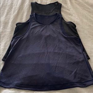 Like new. Jersey tanks. Size 4.